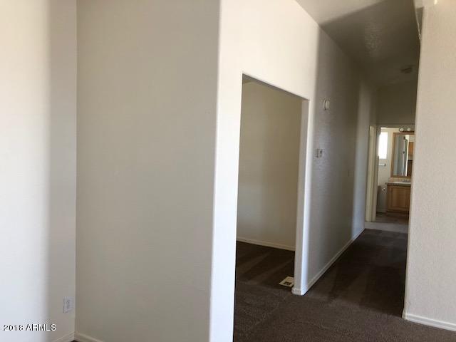 16318 Squatter Road Arizona City, AZ 85123 - Photo 14 of 26 Hall to bedrooms