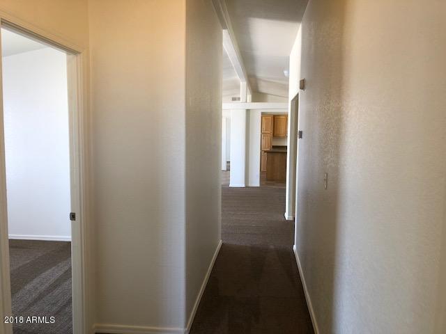 16318 Squatter Road Arizona City, AZ 85123 - Photo 21 of 26 Hallway to kitchen
