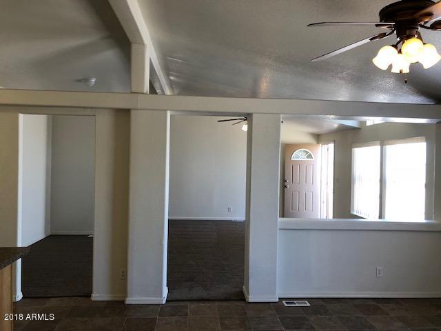 16318 Squatter Road Arizona City, AZ 85123 - Photo 5 of 26 Vaulted ceilings