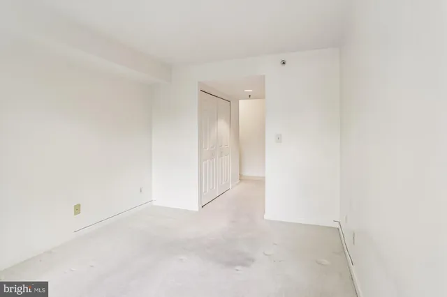 a view of storage and utility room with washer and dryer