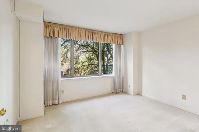 a view of a room with an empty space