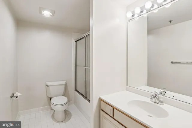 a view of tall buildings and a street