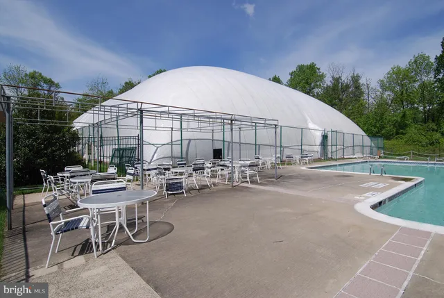 a picture of a bathroom with a shower
