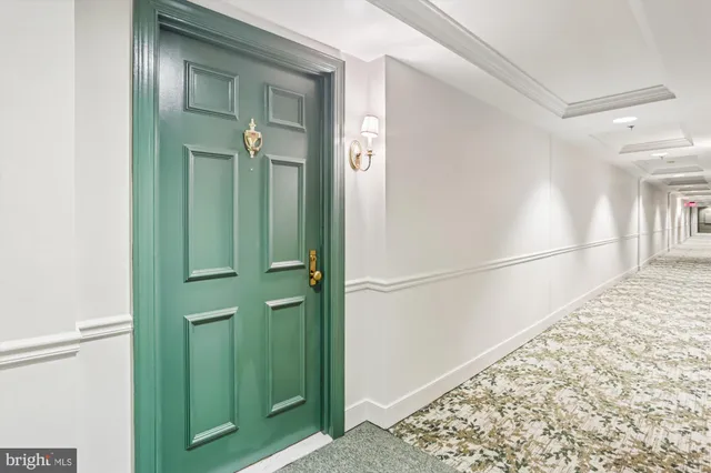 a view of a bathroom with a shower and a sink