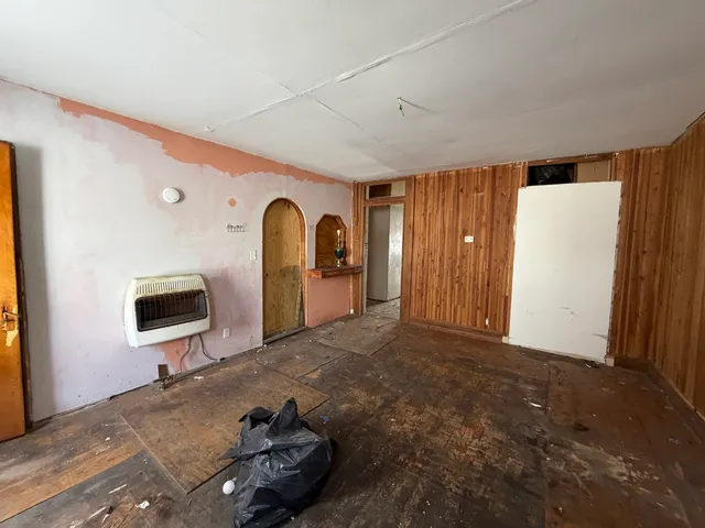 a view of a livingroom with a flat screen tv