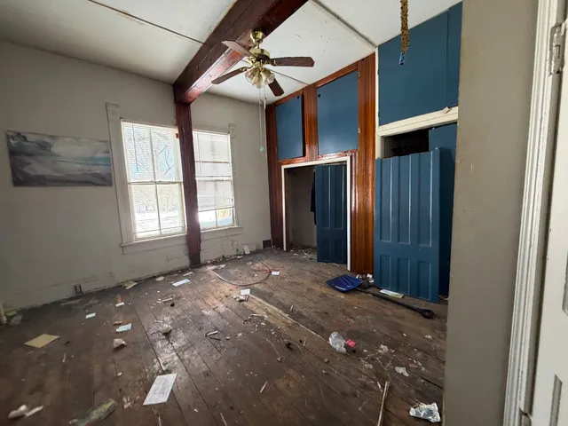 an empty room with windows