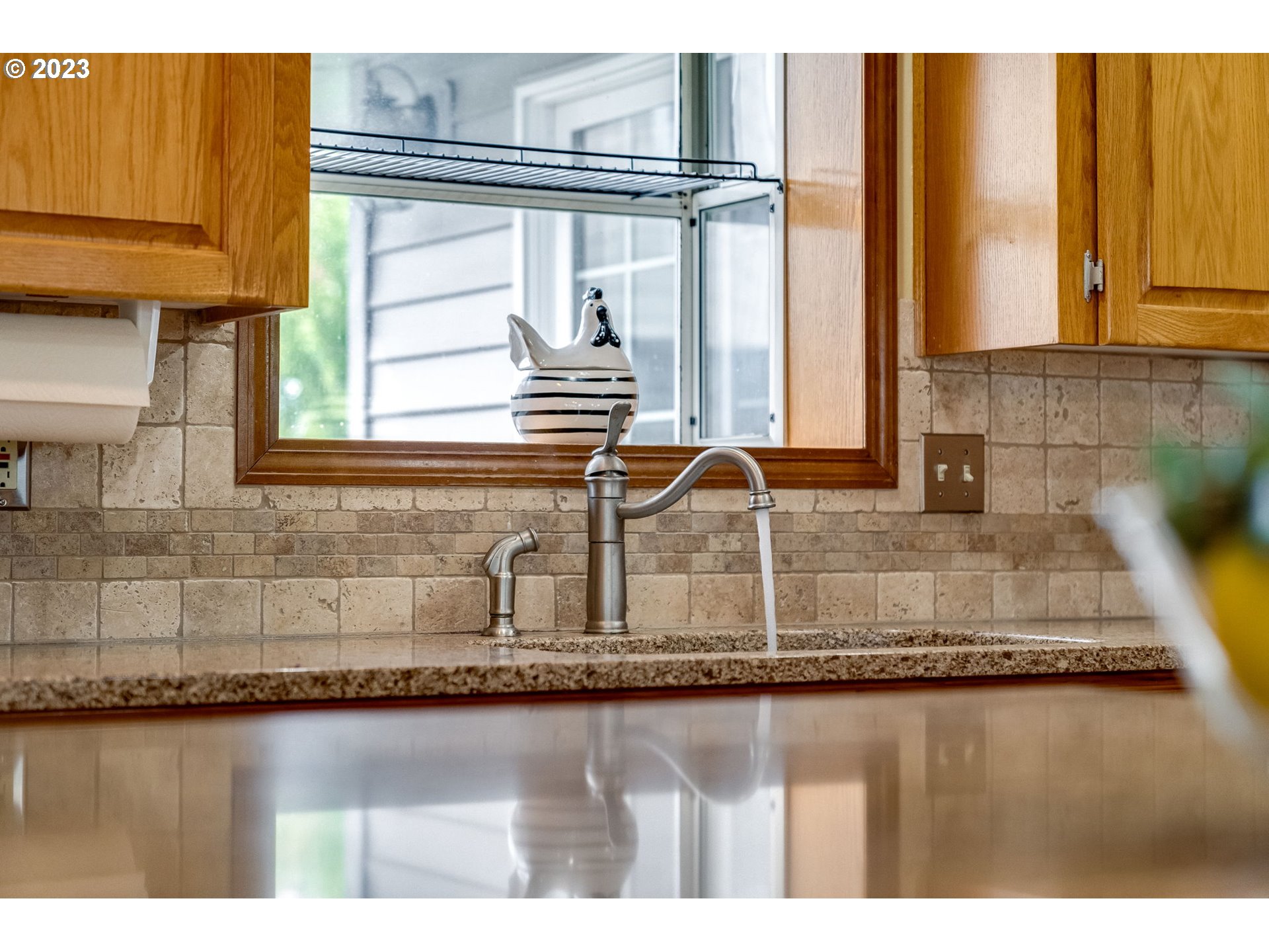1740 North Laurelwood Loop Canby, OR 97013 - Photo 19 of 46 a kitchen with sink and window