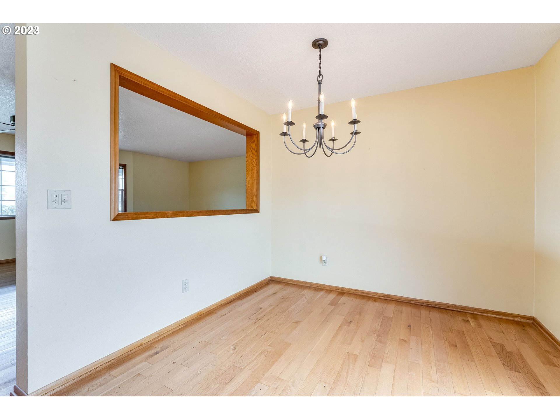 1740 North Laurelwood Loop Canby, OR 97013 - Photo 20 of 46 a view of an empty room with a window