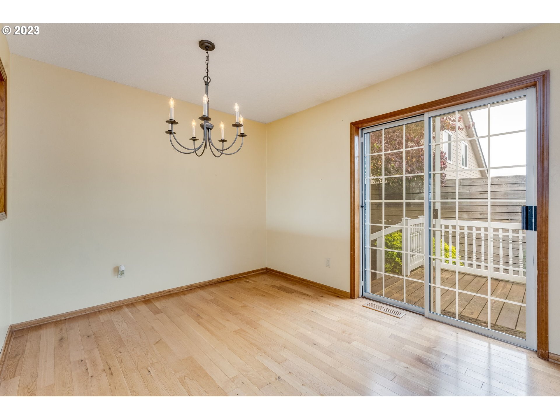 1740 North Laurelwood Loop Canby, OR 97013 - Photo 21 of 46 a view of a room with wooden floor and windows