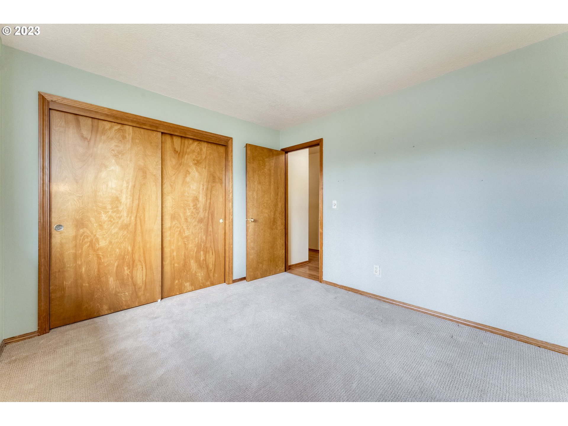 1740 North Laurelwood Loop Canby, OR 97013 - Photo 23 of 46 a view of an empty room with a window