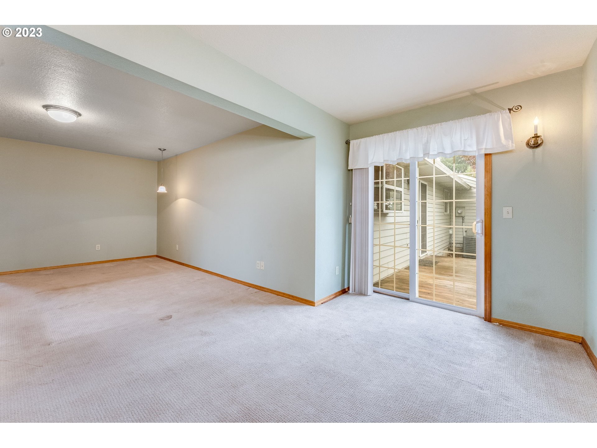 1740 North Laurelwood Loop Canby, OR 97013 - Photo 29 of 46 a view of an empty room with glass door