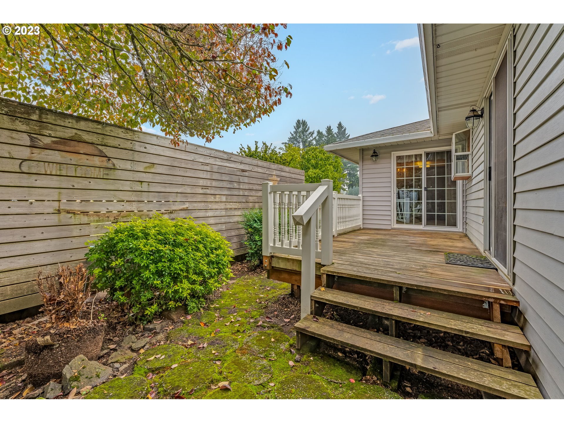 1740 North Laurelwood Loop Canby, OR 97013 - Photo 40 of 46 a view of backyard with deck and outdoor seating