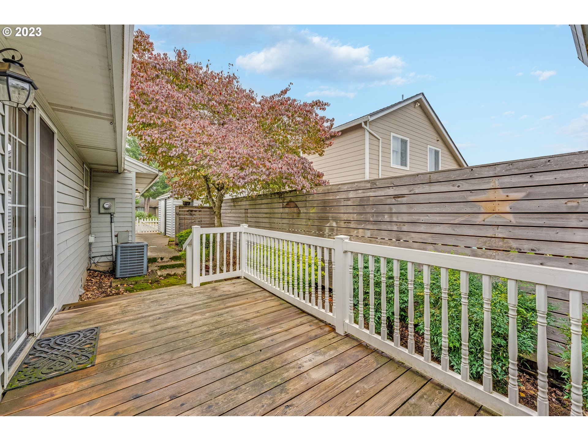 1740 North Laurelwood Loop Canby, OR 97013 - Photo 42 of 46 a view of a house with a balcony