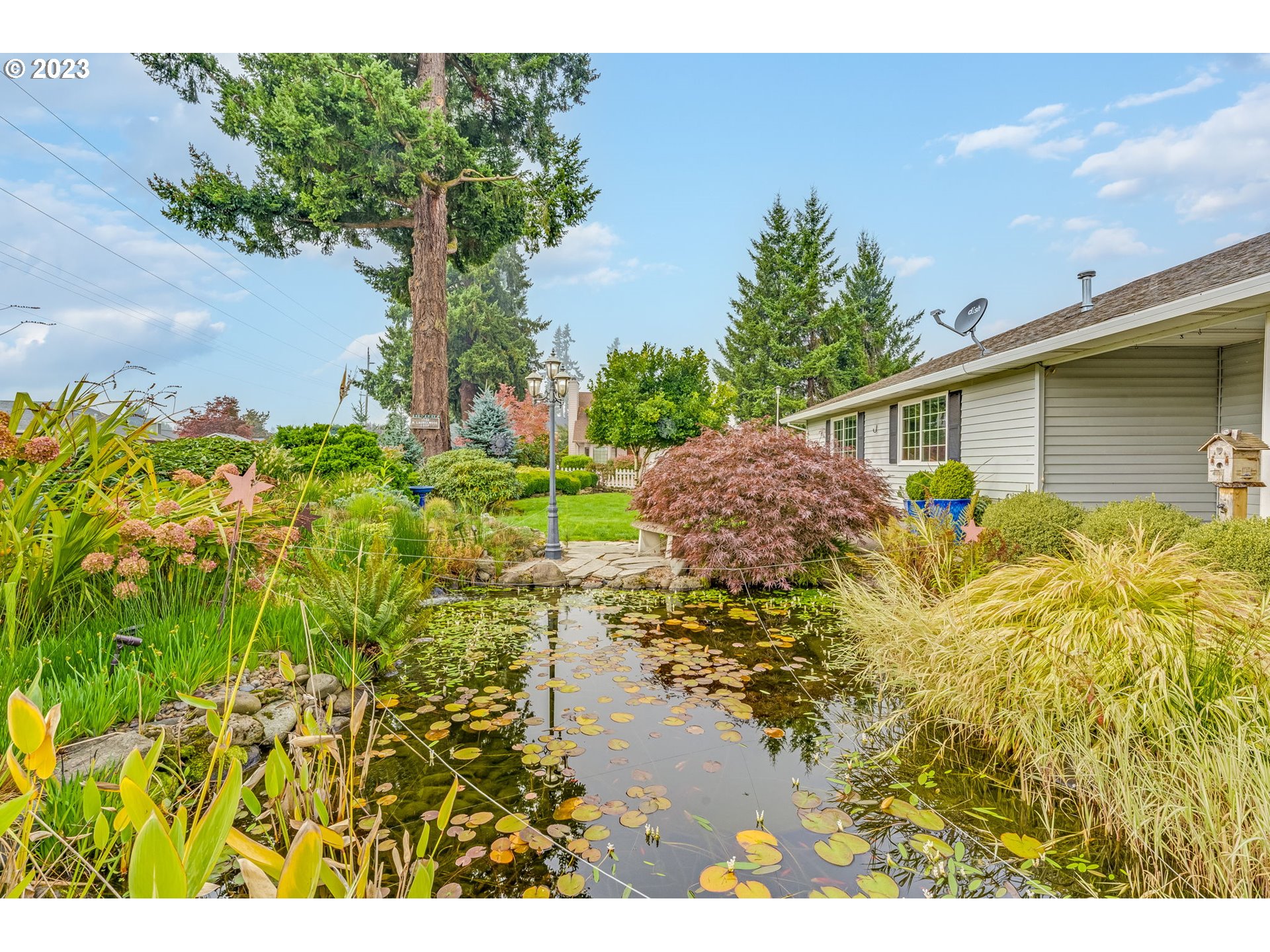 1740 North Laurelwood Loop Canby, OR 97013 - Photo 45 of 46 a view of a backyard