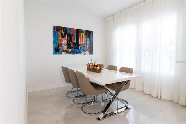 a view of a workspace with furniture