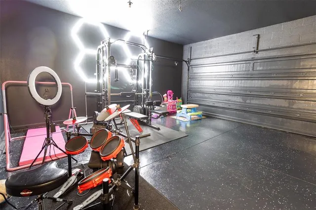 a room with lots of gym equipment