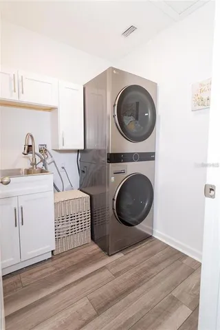 a bedroom with a bed and a stove top oven
