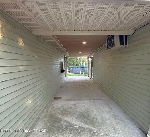 a view of a pathway with a house