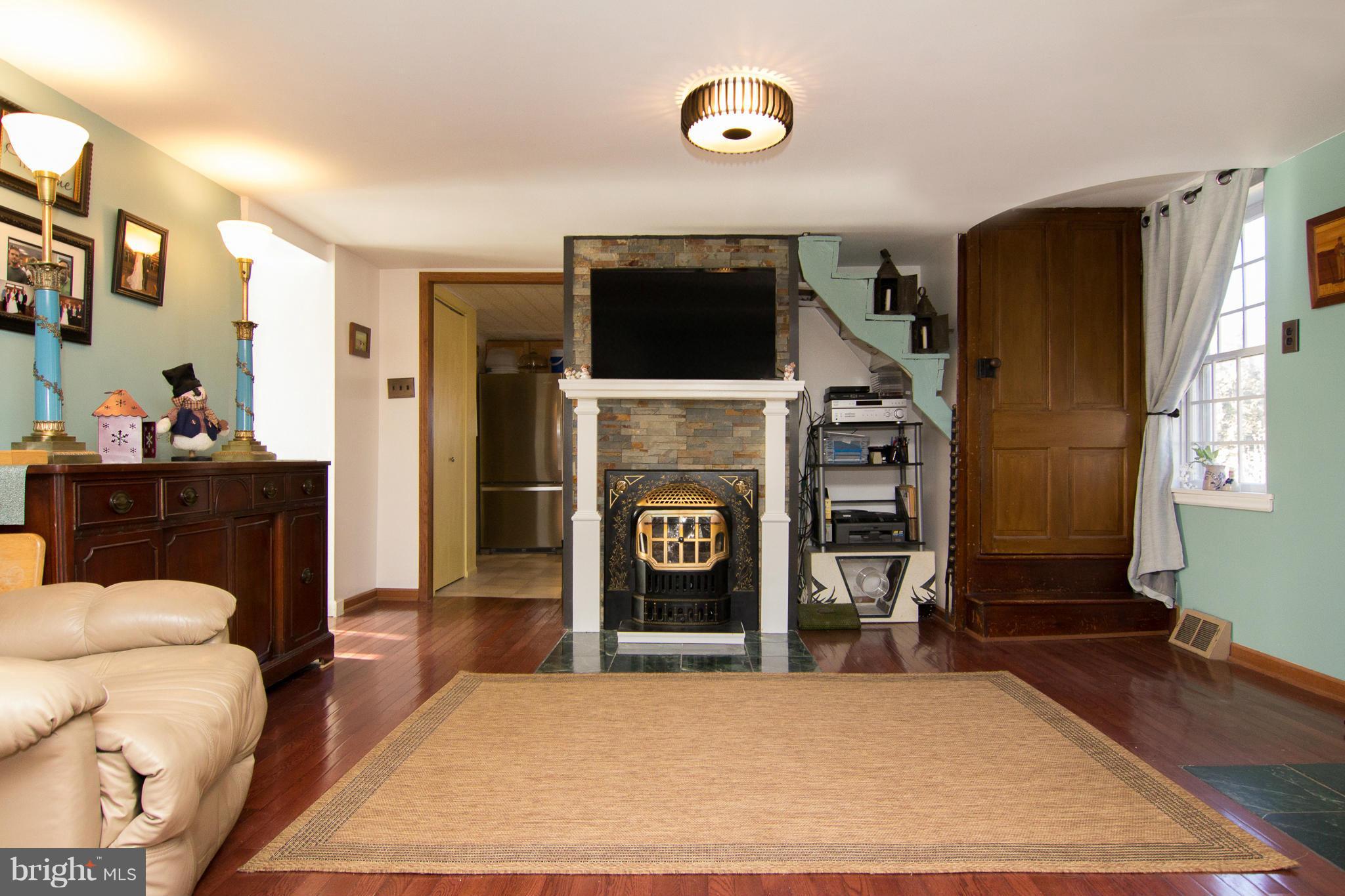 2649 Manchester Road Westminster, MD 21157 - Photo 12 of 30 Grand living room with fireplace &propane insert