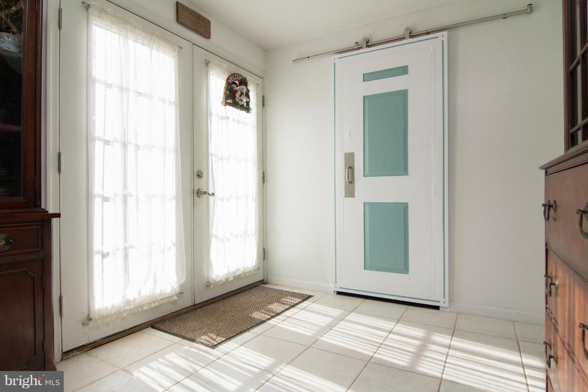2649 Manchester Road Westminster, MD 21157 - Photo 16 of 30 Refinished sliding door to downstairs bathroom
