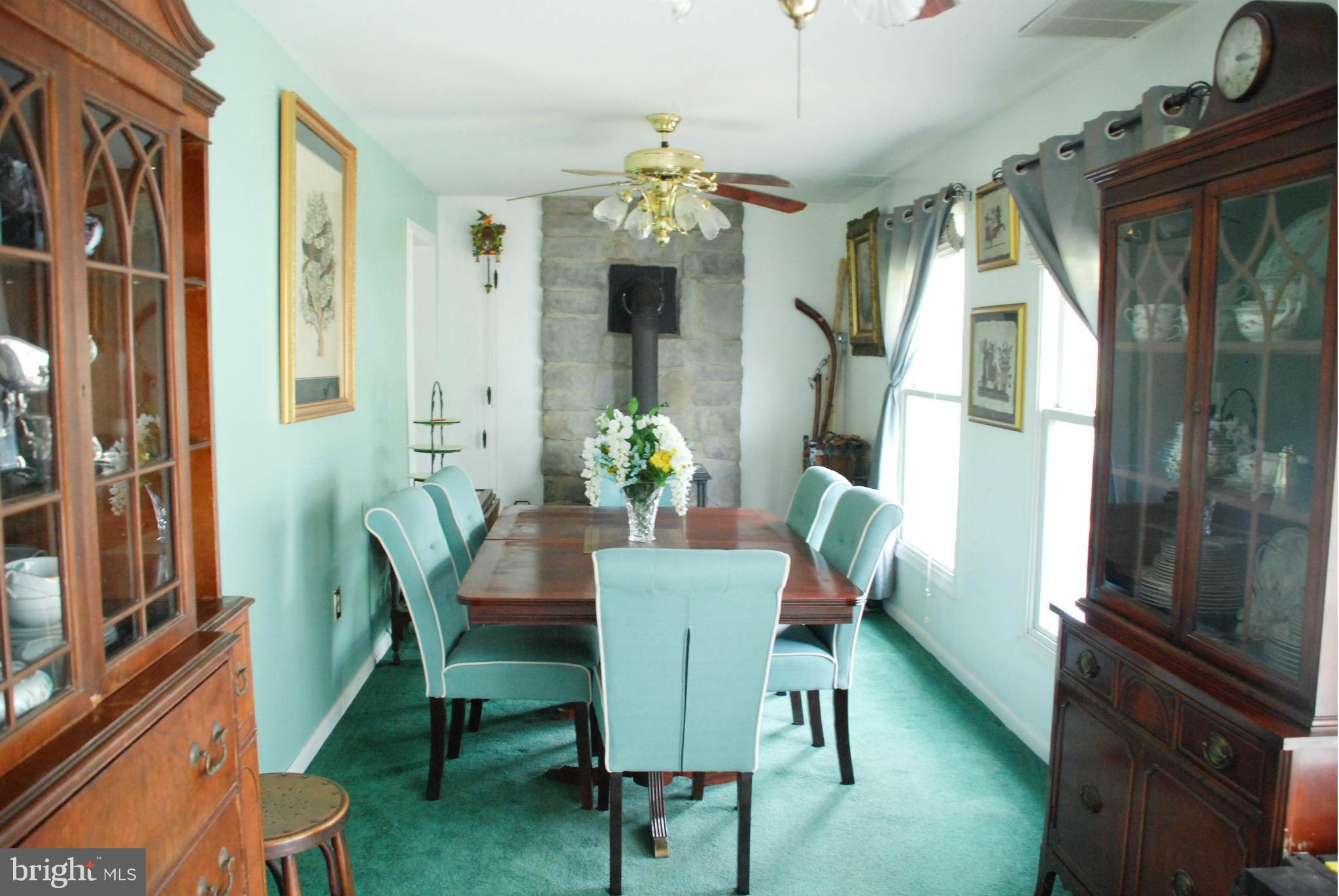 2649 Manchester Road Westminster, MD 21157 - Photo 7 of 30 Sunny dining room with wood stove!