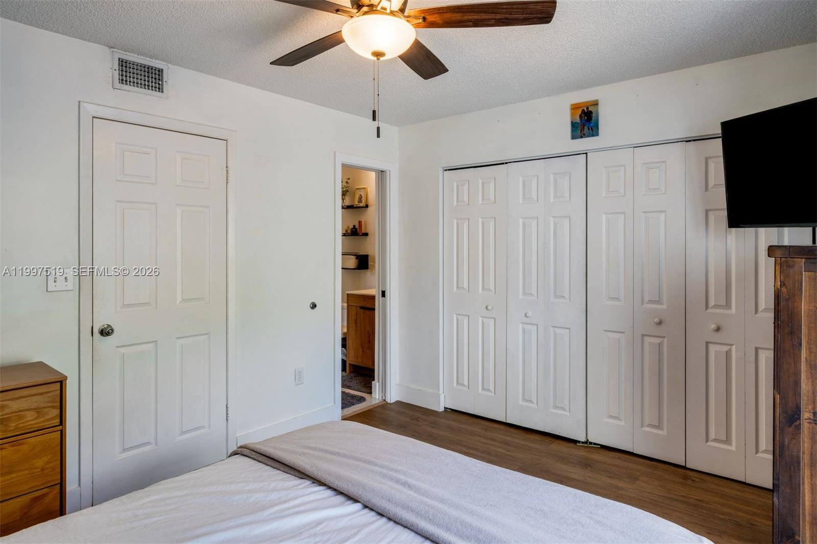 10415 Southwest 154th Court, Unit 2 Miami, FL 33196 - Photo 15 of 27 a view of a livingroom with a chandelier fan