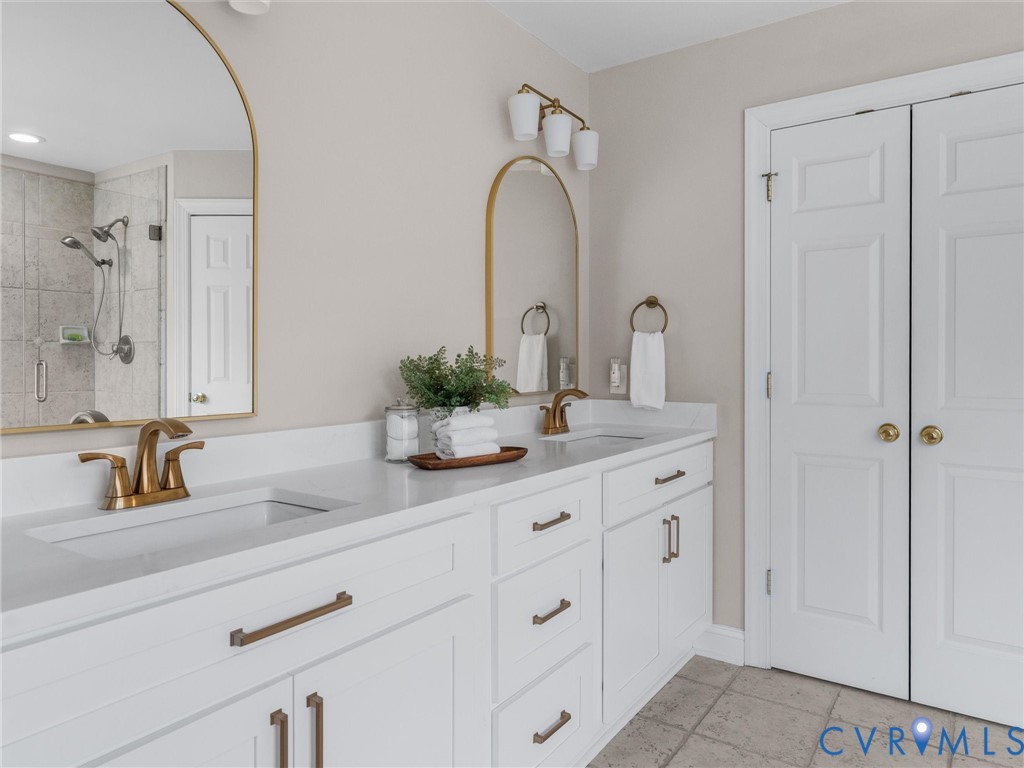 14335 Lander Road Midlothian, VA 23113 - Photo 40 of 70 a bathroom with a sink and a mirror