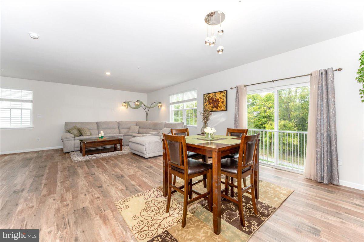 2052 Pomona Way Frederick, MD 21702 - Photo 17 of 71 a living room with furniture and a large window