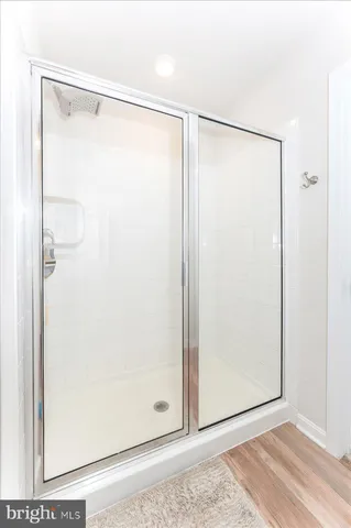 a large white bed in a white room