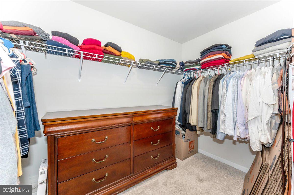 2052 Pomona Way Frederick, MD 21702 - Photo 32 of 71 a view of walk in closet with clothes and shoes