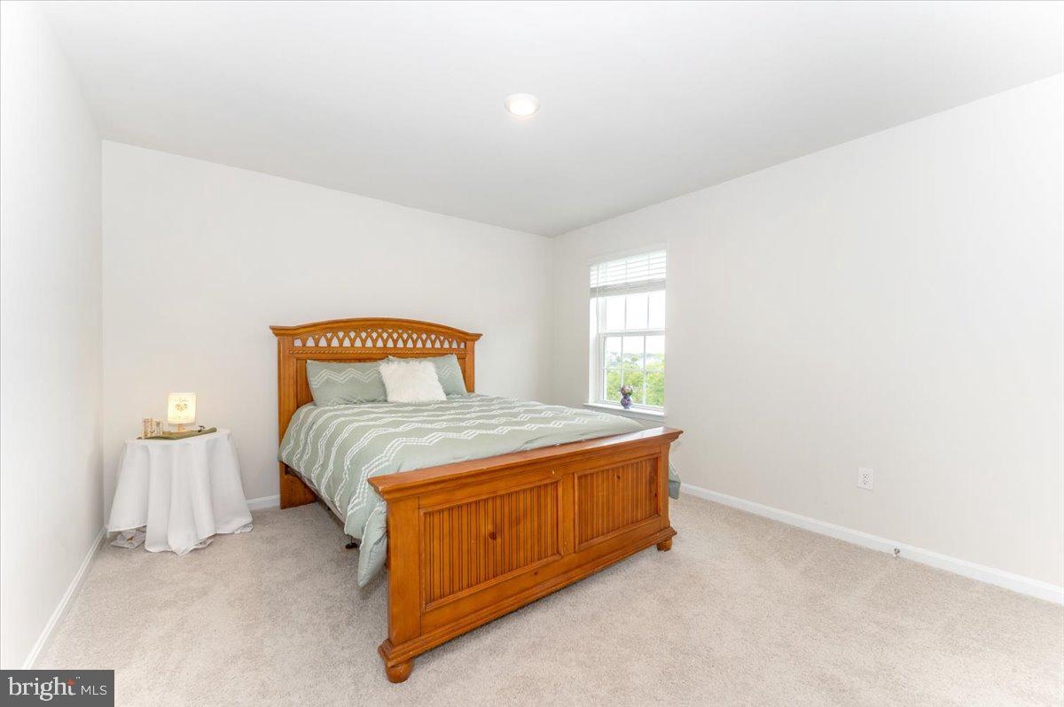 2052 Pomona Way Frederick, MD 21702 - Photo 35 of 71 a bedroom with a bed and window