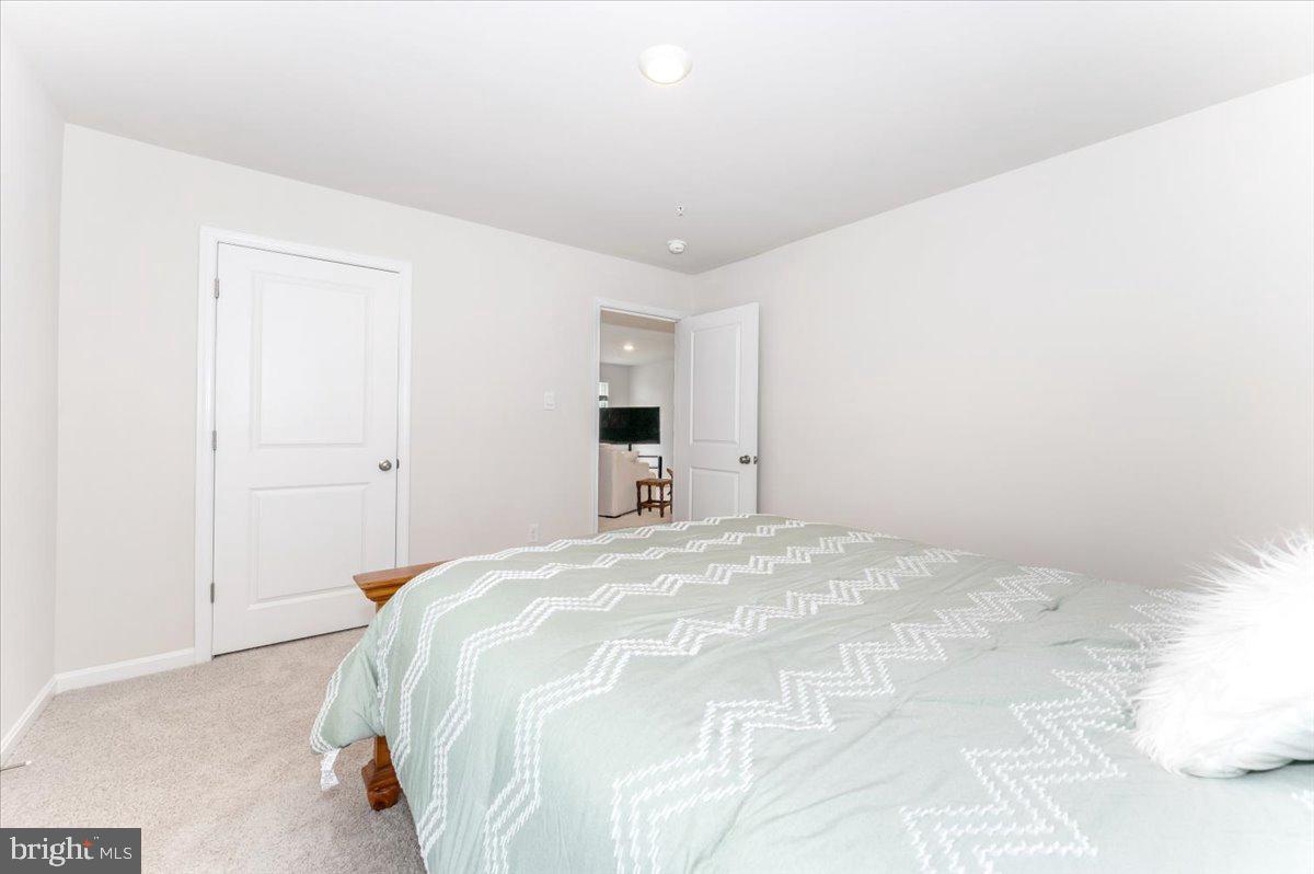2052 Pomona Way Frederick, MD 21702 - Photo 36 of 71 a large white bed in a white room