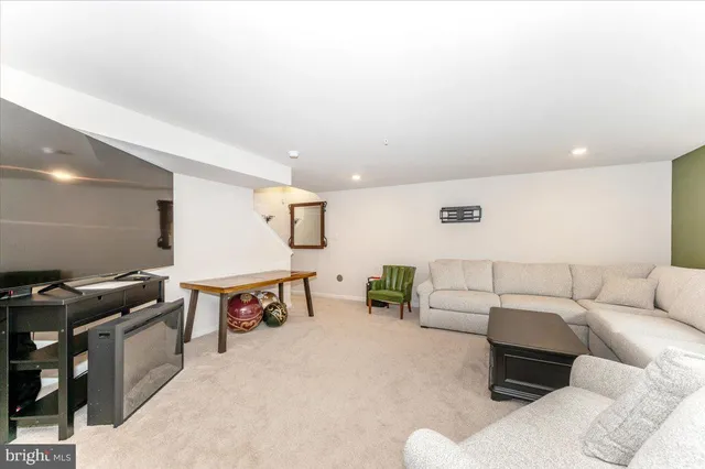 a living room with furniture and a couch