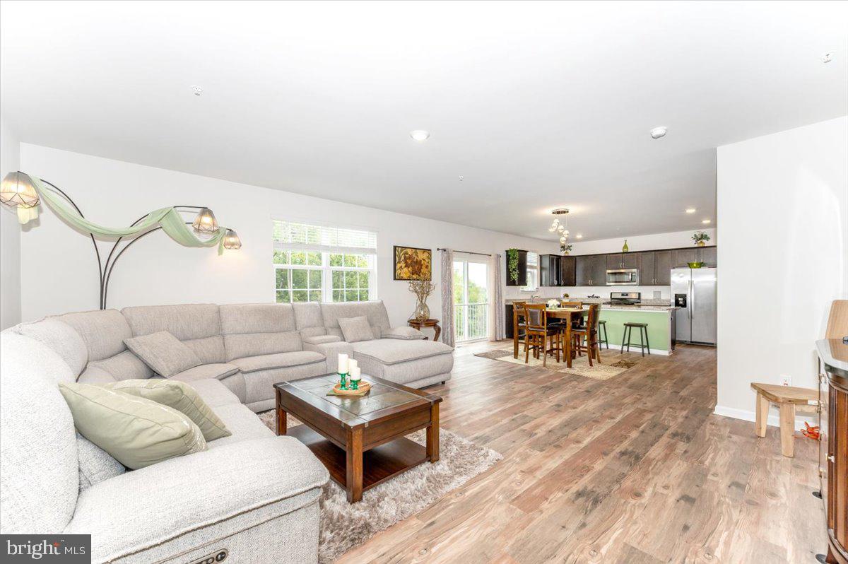 2052 Pomona Way Frederick, MD 21702 - Photo 4 of 71 a living room with furniture and wooden floor