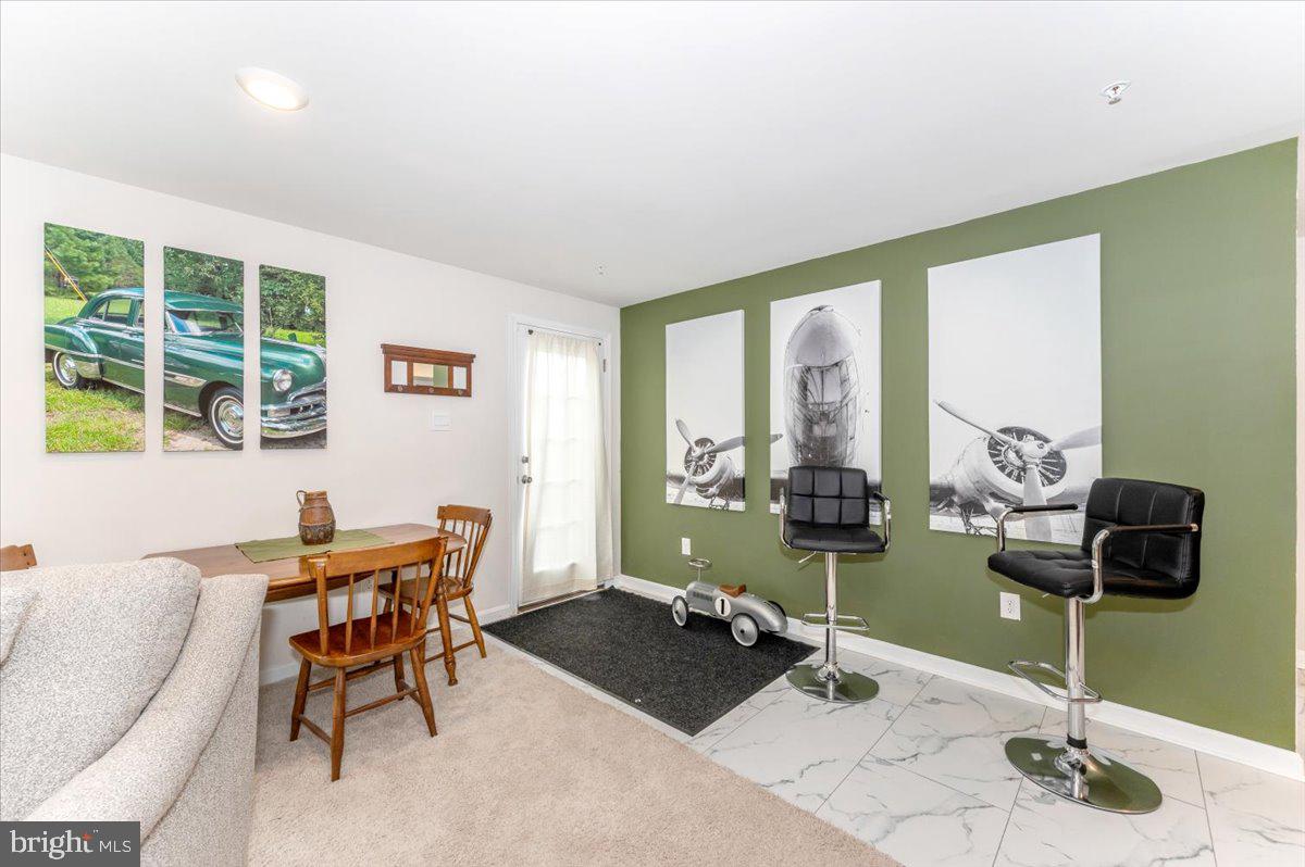 2052 Pomona Way Frederick, MD 21702 - Photo 42 of 71 a living room with furniture and a large window