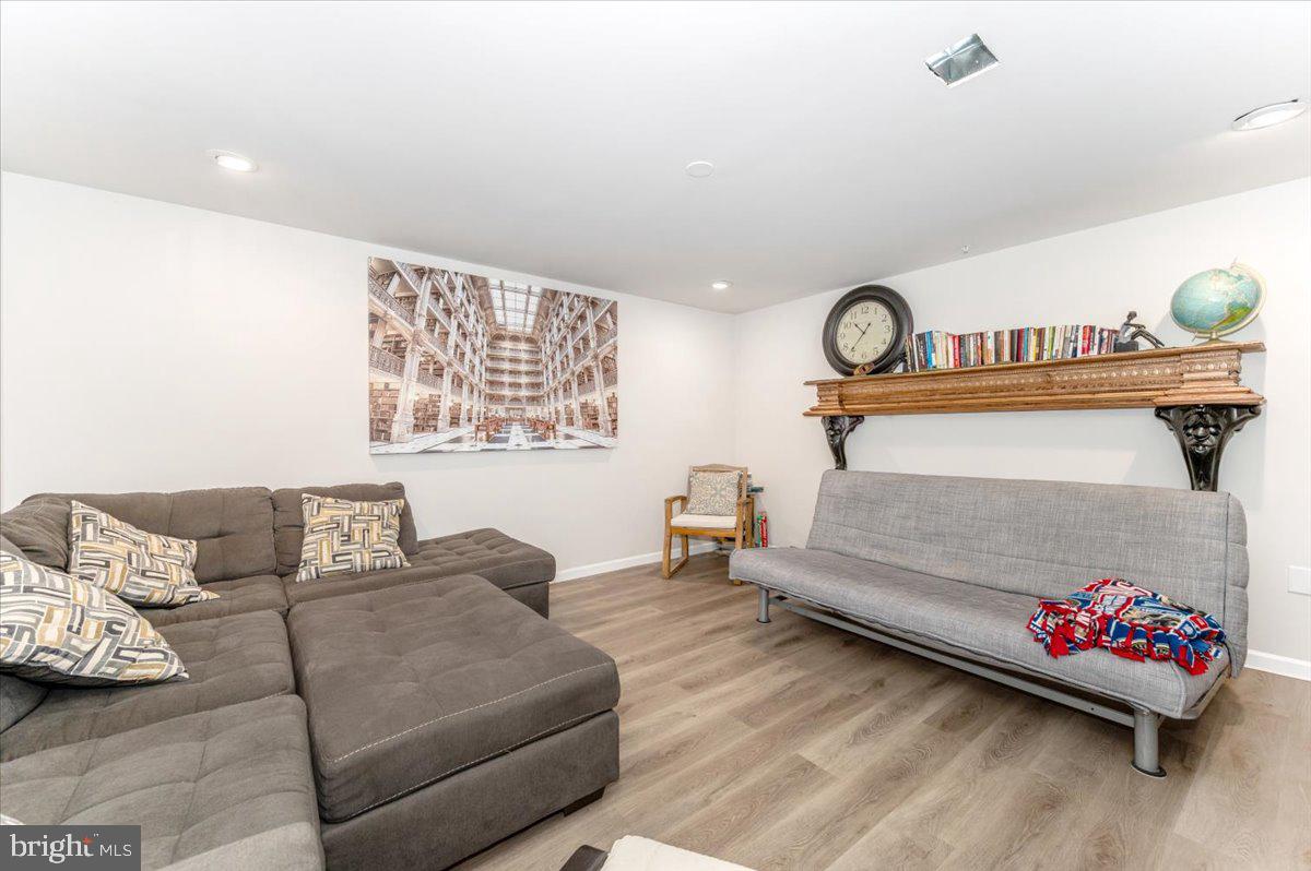 2052 Pomona Way Frederick, MD 21702 - Photo 50 of 71 a living room with furniture and a couch