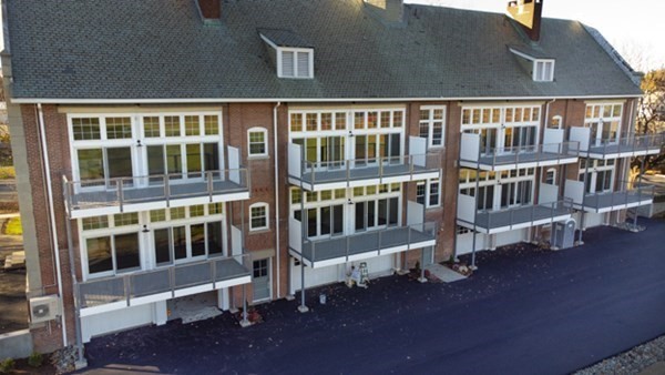 58 Main Street, Unit 4 Hatfield, MA 01038 - Photo 18 of 42 a view of front of a building with a porch
