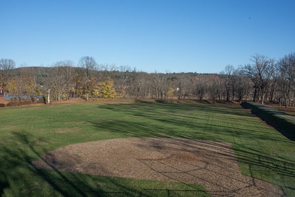 58 Main Street, Unit 4 Hatfield, MA 01038 - Photo 42 of 42 a view of a grassy field with an trees