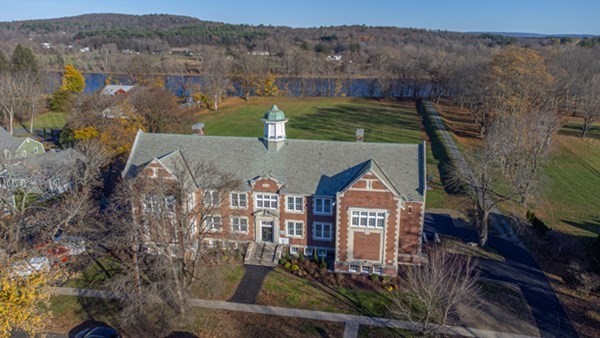58 Main Street, Unit 4 Hatfield, MA 01038 - Photo 5 of 42 a view of a big yard in front of the house