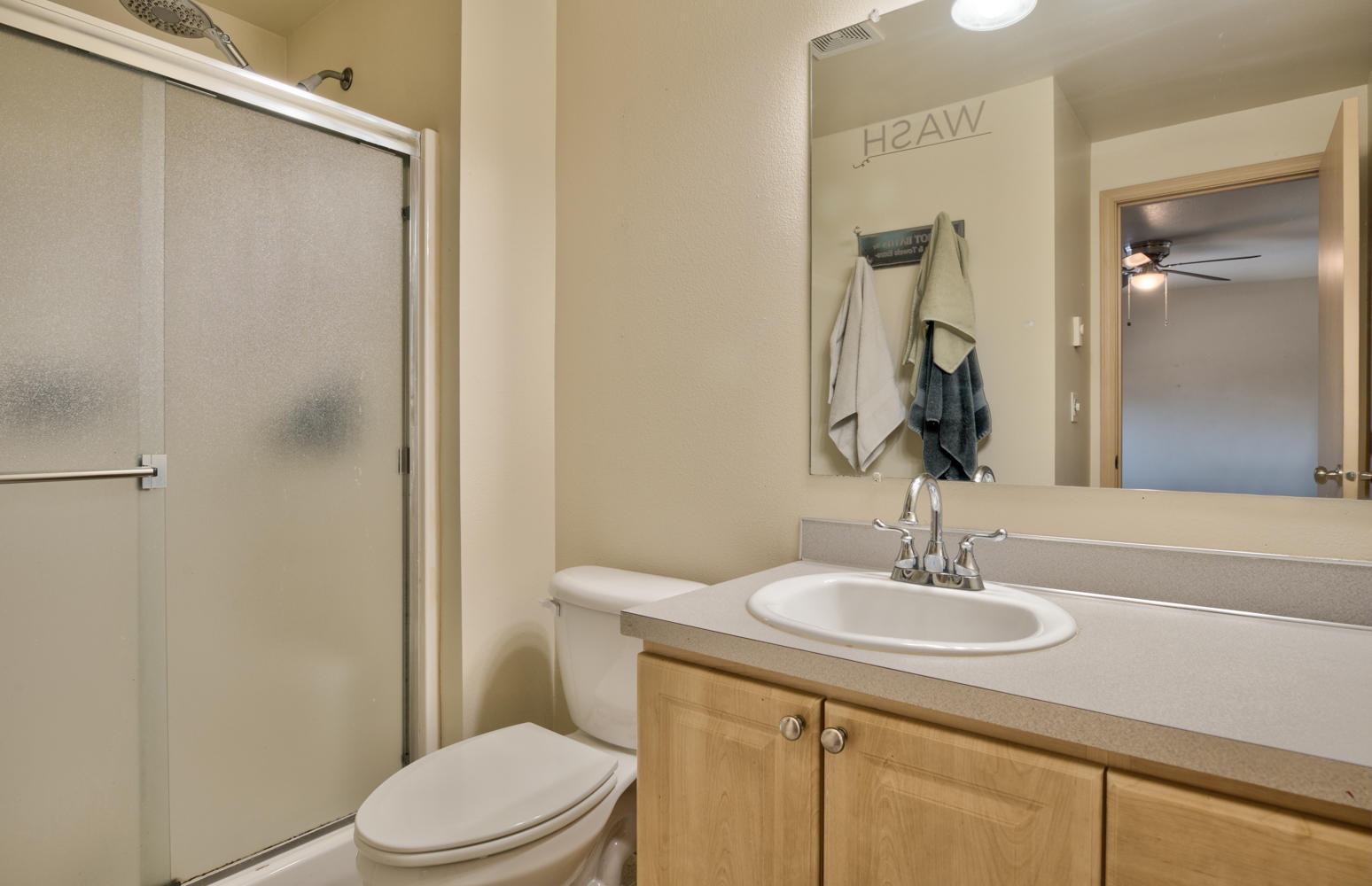 19660 Apache Road Bend, OR 97702 - Photo 27 of 33 a bathroom with a sink a toilet and shower