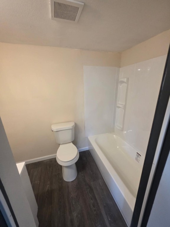 446 Lexington Livingston, TX 77351 - Photo 12 of 14 a bathroom with a toilet and a sink