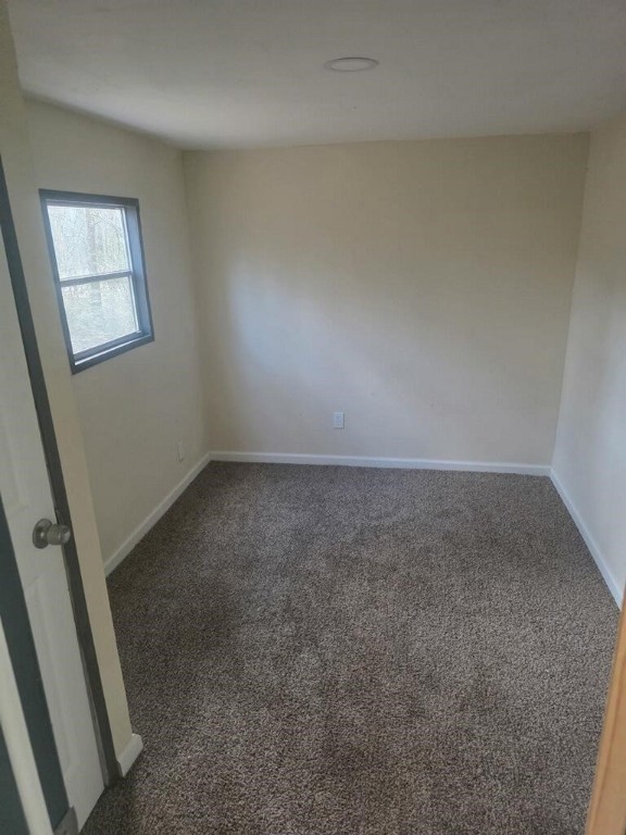 446 Lexington Livingston, TX 77351 - Photo 10 of 14 an empty room with windows