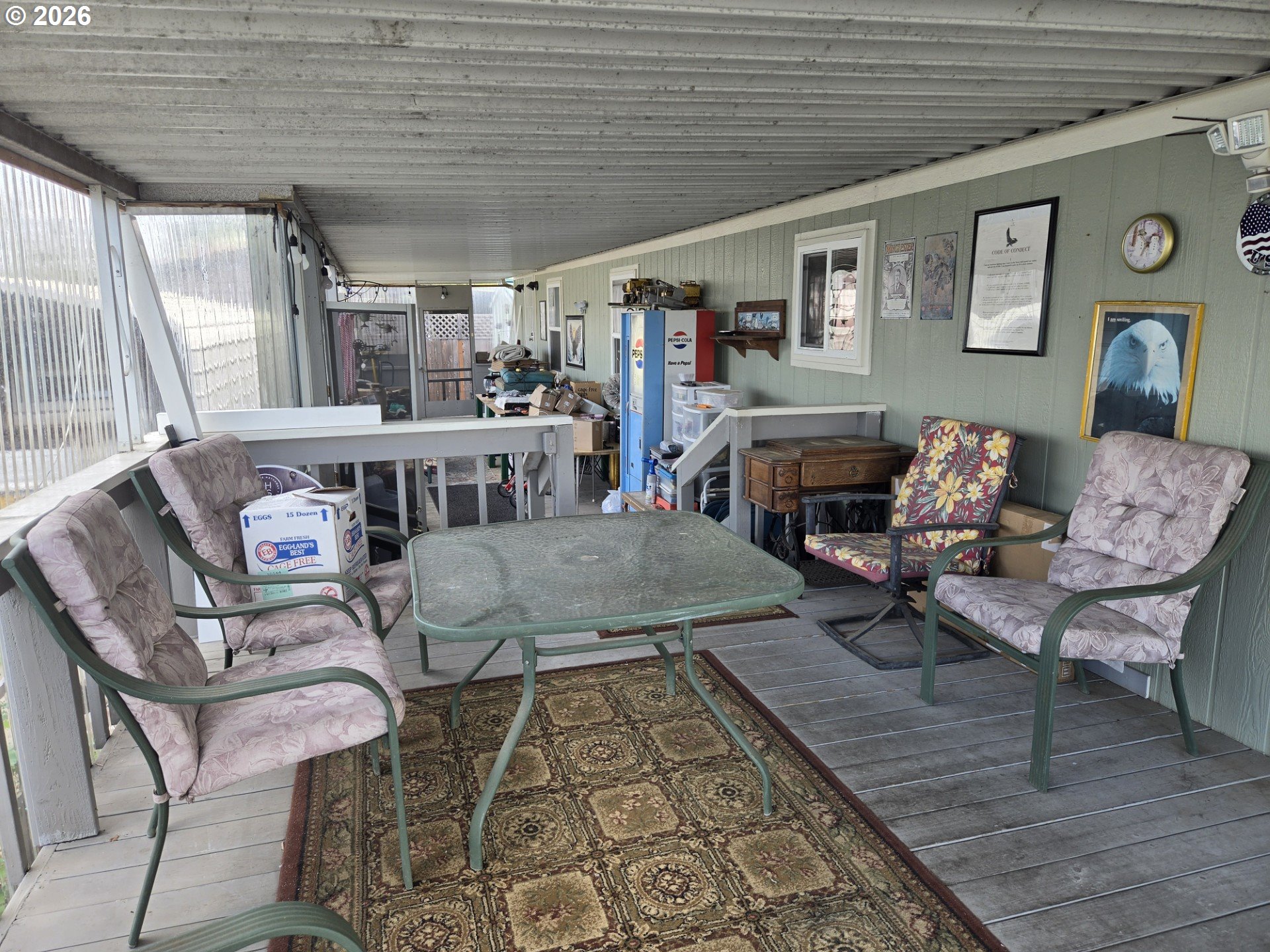 428 South State Street Sutherlin, OR 97479 - Photo 4 of 10 a living room with furniture and a fireplace