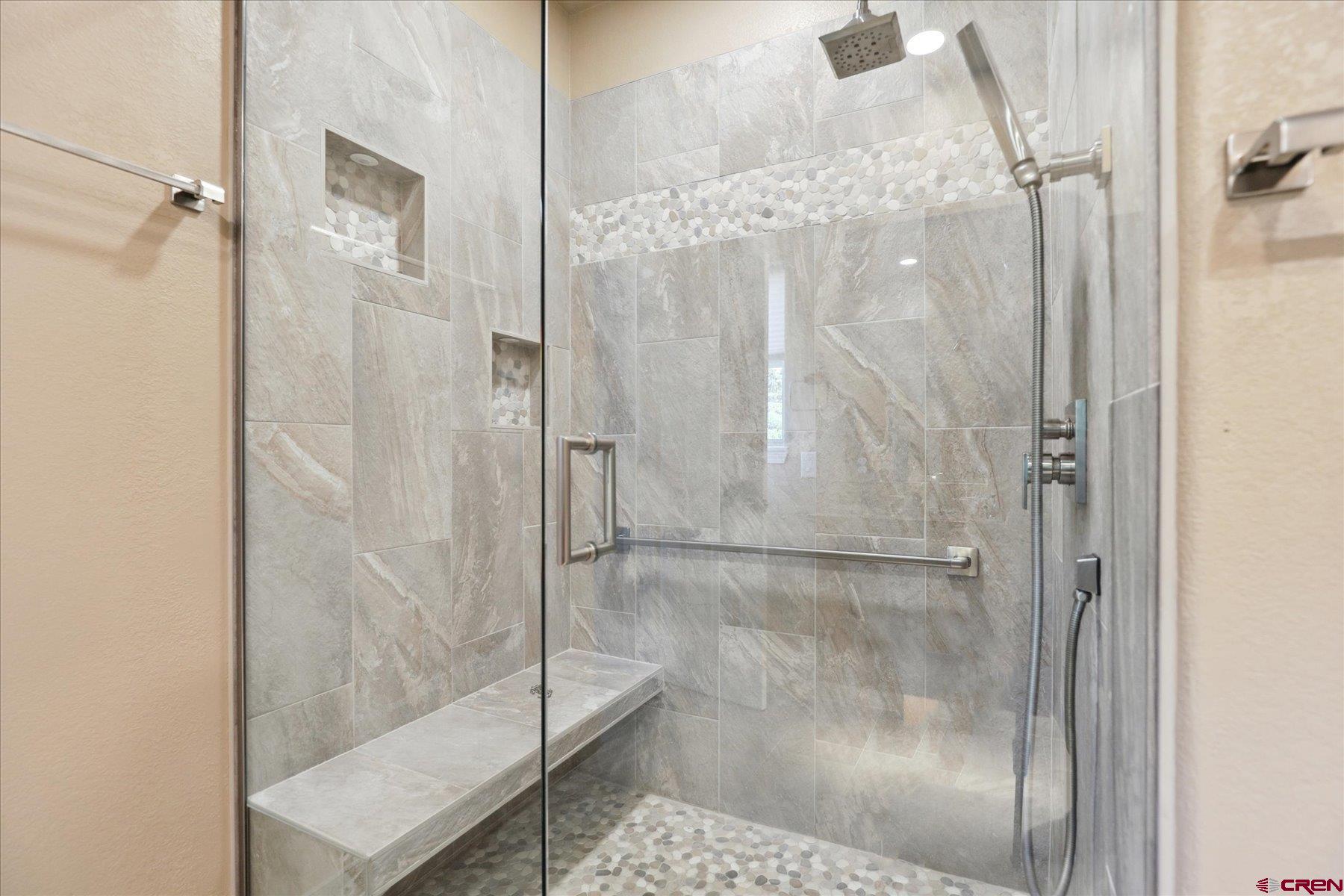 331 Jenkins Ranch Road Durango, CO 81301 - Photo 19 of 35 a bathroom with a glass shower door
