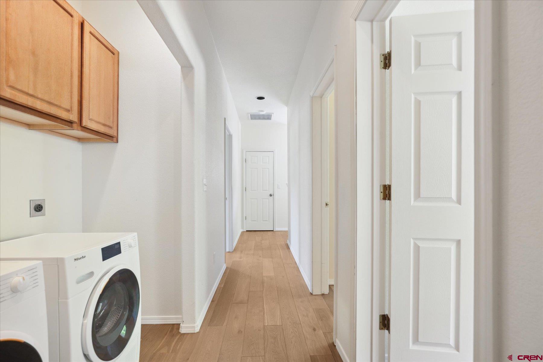 331 Jenkins Ranch Road Durango, CO 81301 - Photo 22 of 35 a view of a hallway with washer and dryer