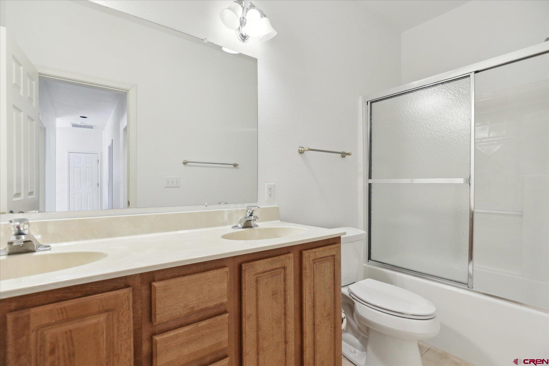 331 Jenkins Ranch Road Durango, CO 81301 - Photo 23 of 35 a bathroom with a sink a toilet and shower