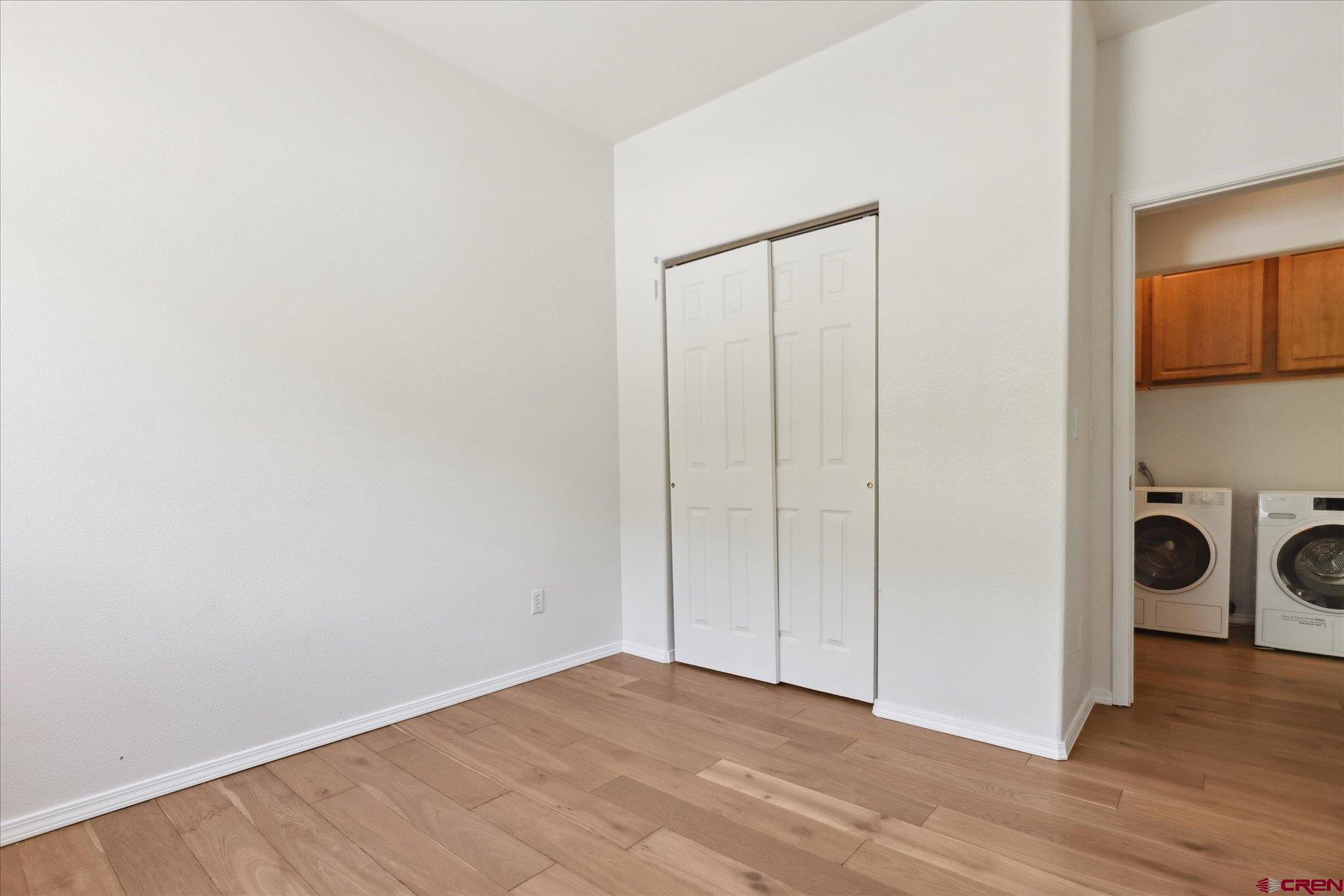 331 Jenkins Ranch Road Durango, CO 81301 - Photo 26 of 35 a view of an empty room and wooden floor
