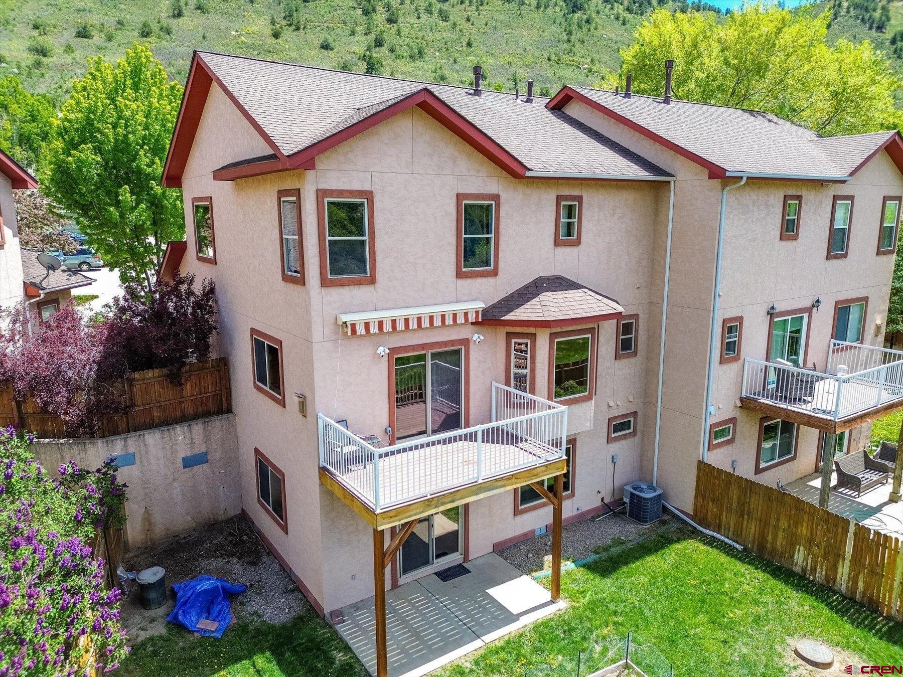 331 Jenkins Ranch Road Durango, CO 81301 - Photo 33 of 35 a aerial view of a house with a yard and potted plants