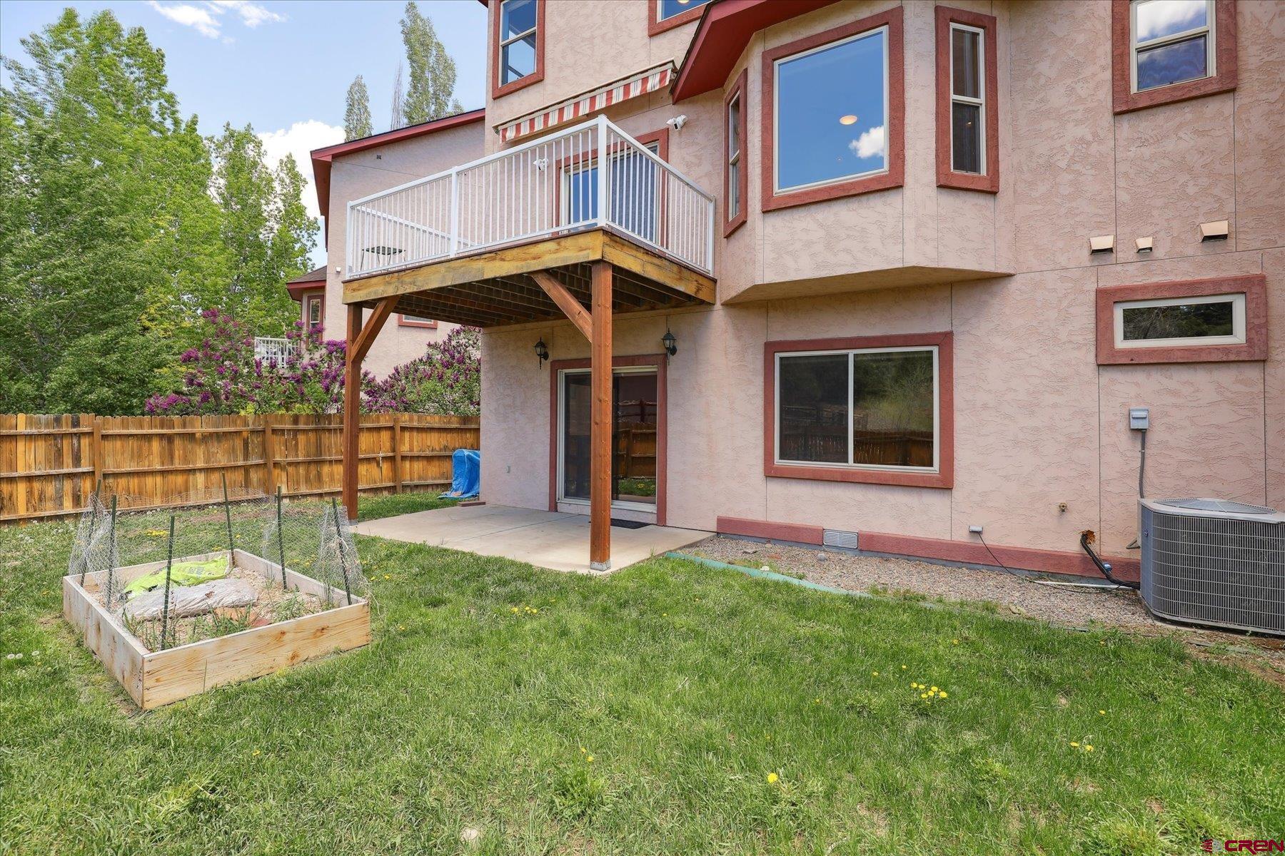 331 Jenkins Ranch Road Durango, CO 81301 - Photo 34 of 35 a view of a house with a yard and sitting area