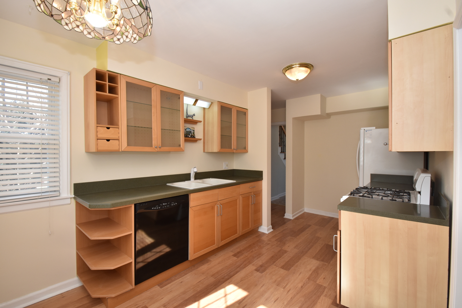 735 East Golf Road Des Plaines, IL 60016 - Photo 11 of 31 a kitchen with stainless steel appliances granite countertop a stove and a refrigerator